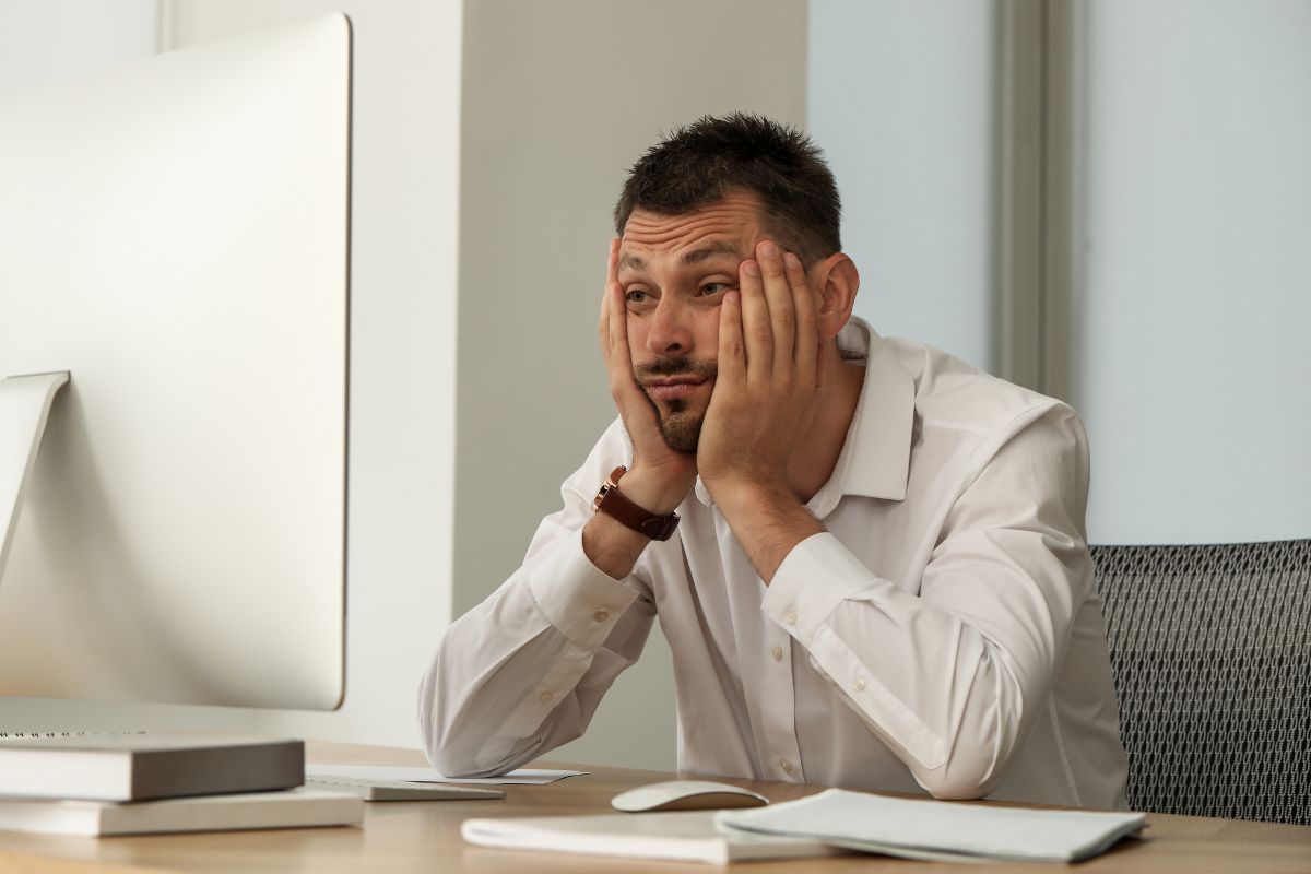 Man at work trying to focus with ADHD