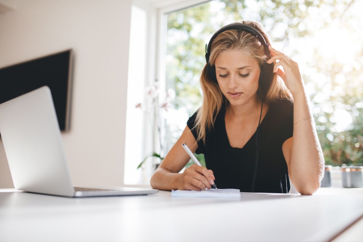 Woman with ADHD trying to say focused at work.