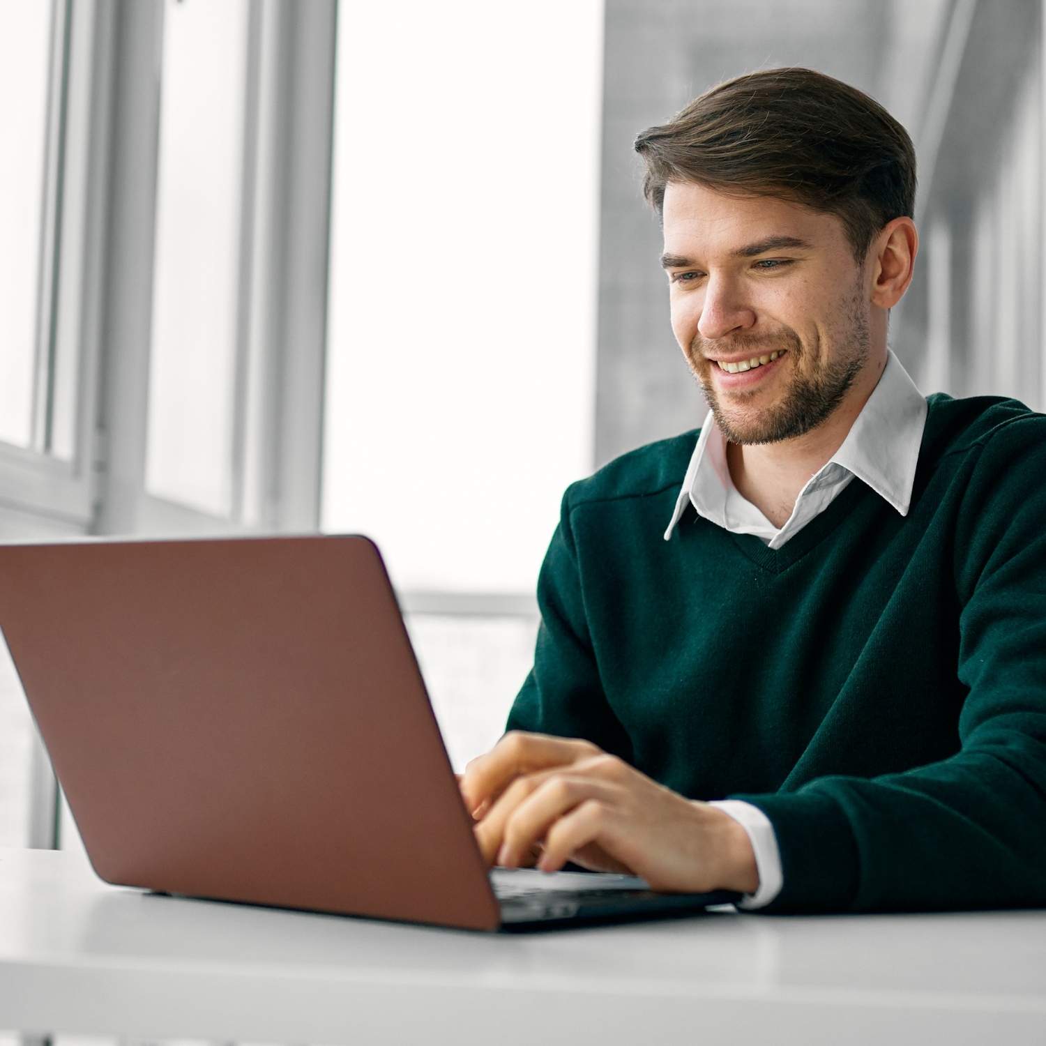 mcat-evaluation-accommodations-online Adult man using a laptop for MCAT preparation and accommodations evaluation support